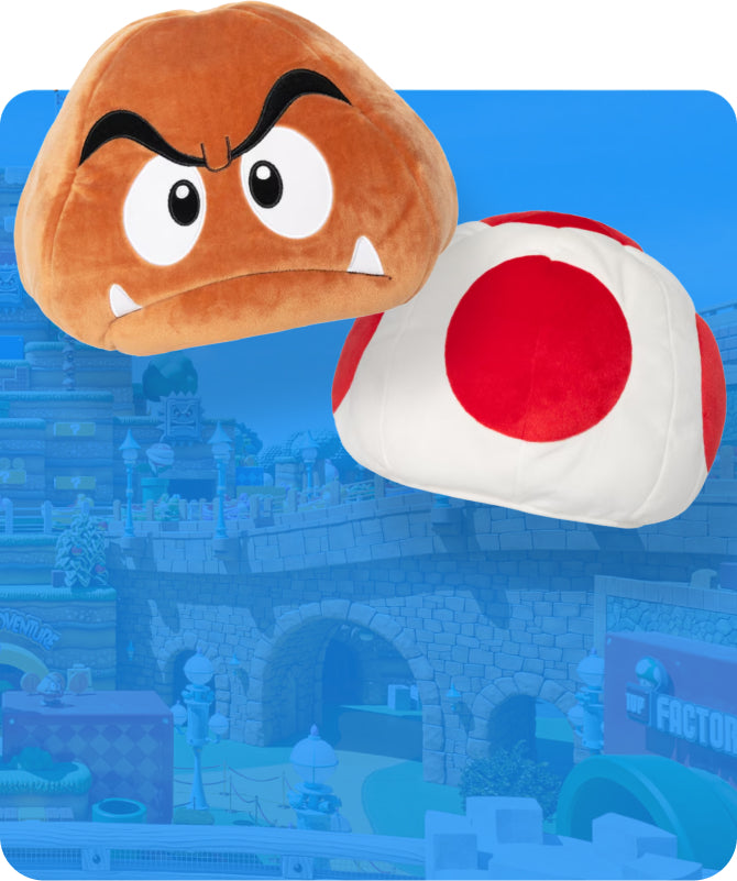 Two plush toys, including a Goomba and Toad hat against a blue background in with SUPER NINTENDO WORLD™ in the background - click to shop SUPER NINTENDO WORLD™ Accessories now!