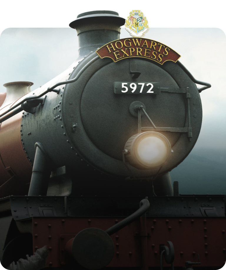 Hogwarts Express steam train with the number 5972 on a cloudy day - click to shop Harry Potter™ Accessories!